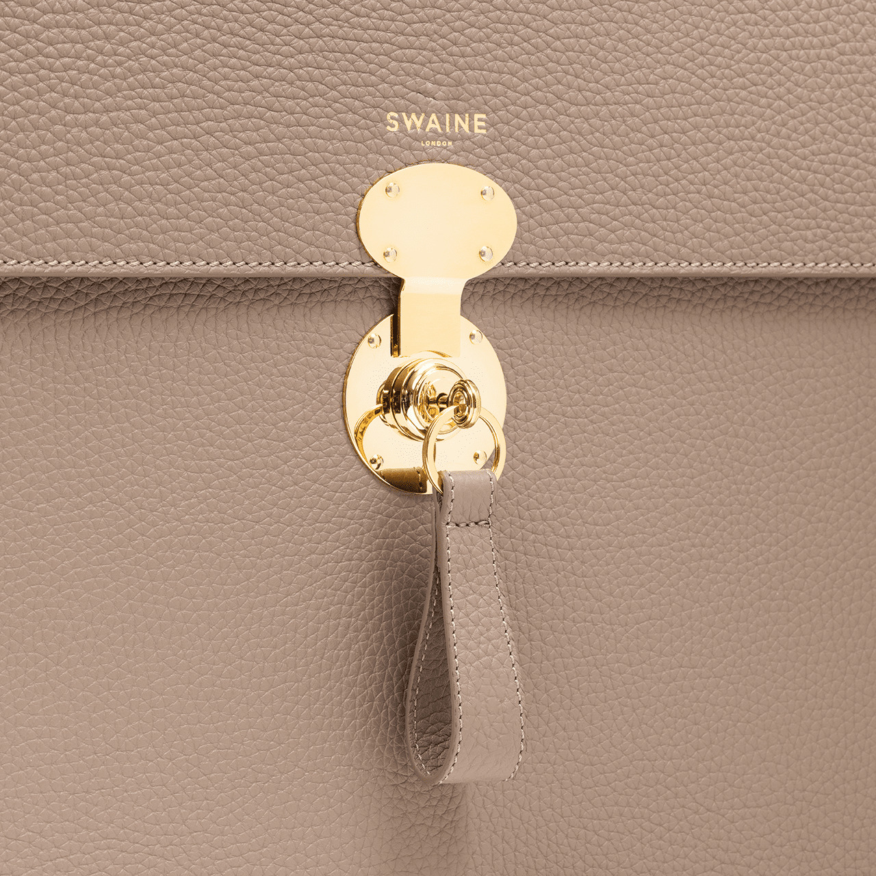 President - Taupe Pebble - Swaine Group Ltd